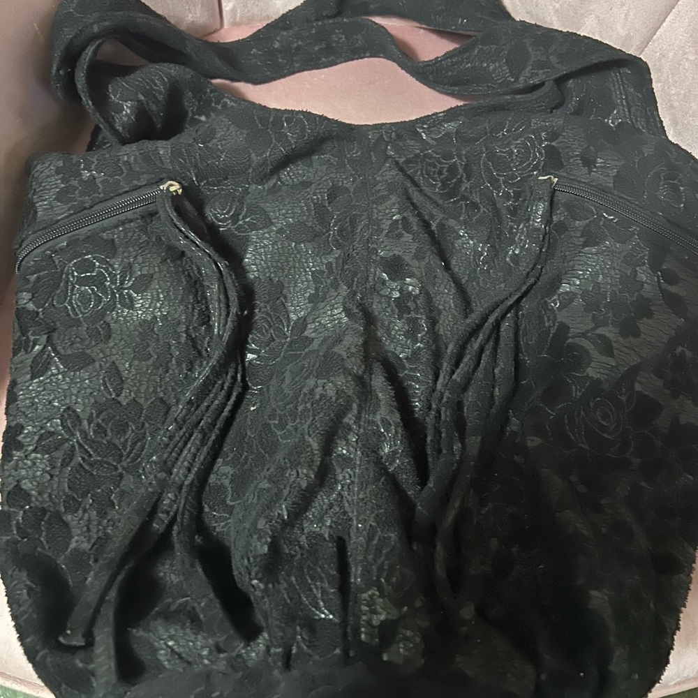 Used black flower embroidered tote from Buckle
